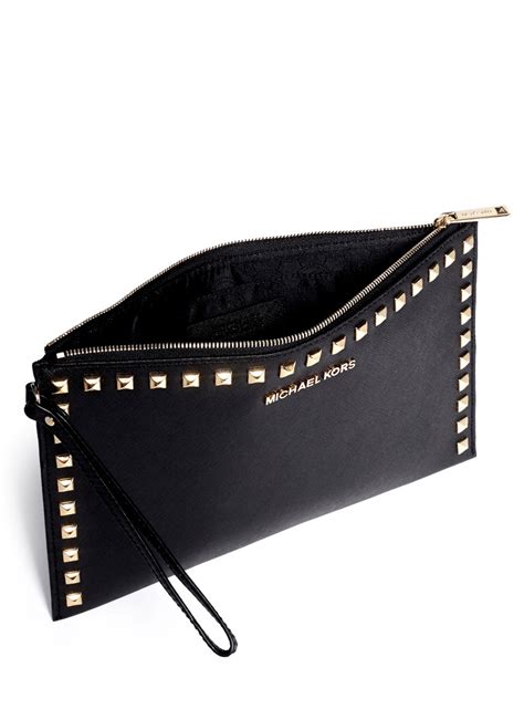 michael kors travel clutch|michael kors studded clutch.